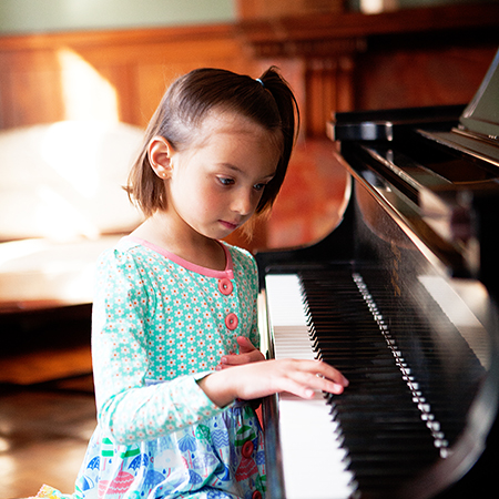 Girl Playing The Piano