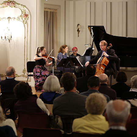 prometheus trio playing for crowd