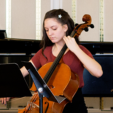 girl playing cello