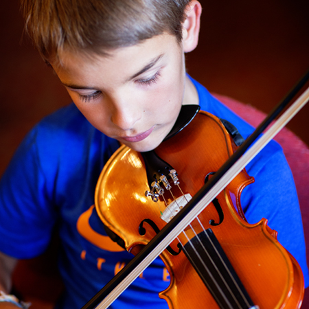 boy playing violin