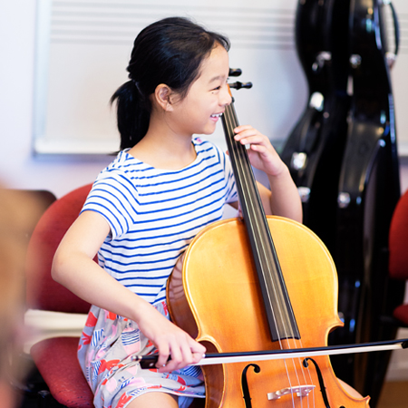 teenager playing cello