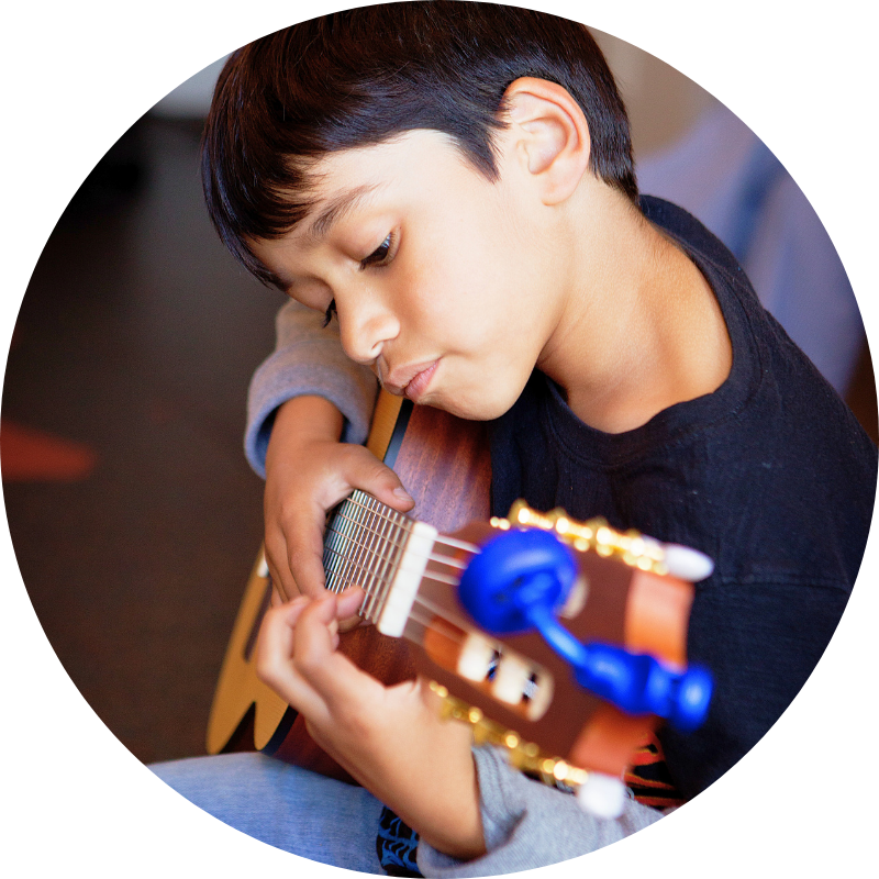 img-girl-light-strumming-guitar